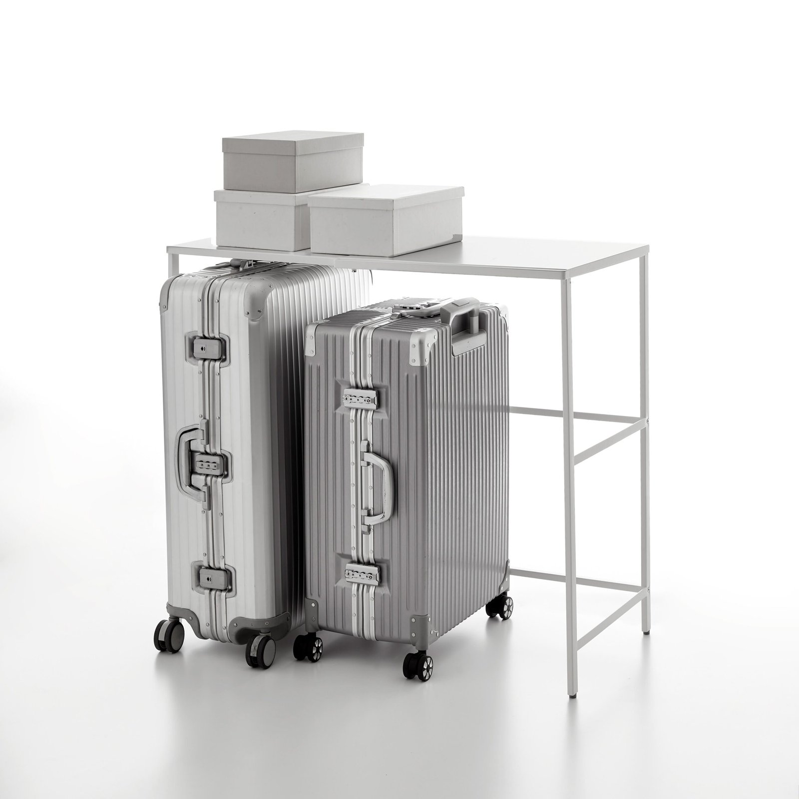 iv6wcvqxaacb8vdhu3pg-1.jpg Expandable Suitcase Rack - Steel - Image 1